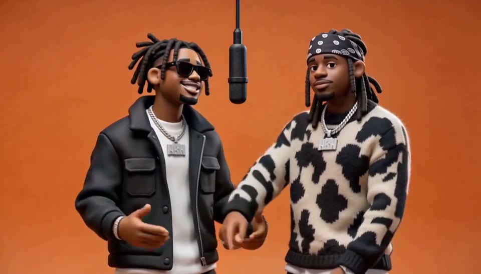 Two clay-style characters performing beside a hanging microphone against a vibrant orange studio backdrop